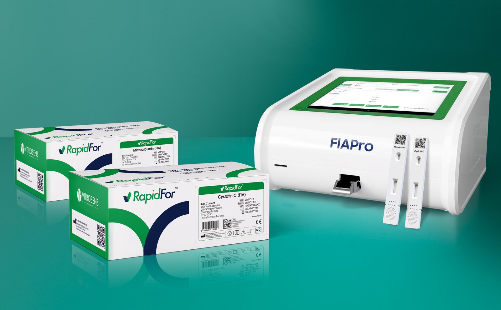 Figure 4: RapidFor™ Cystatin C and Microalbumin Urine test cassettes alongside the FIAPro™ Analyzer System.